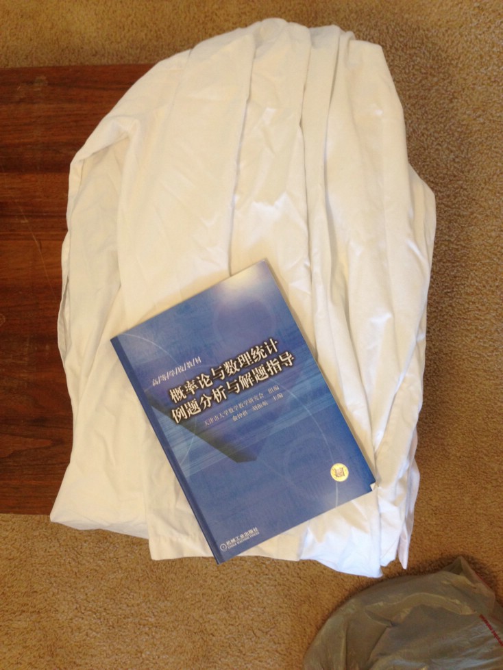 统计学书和lab coat.JPG